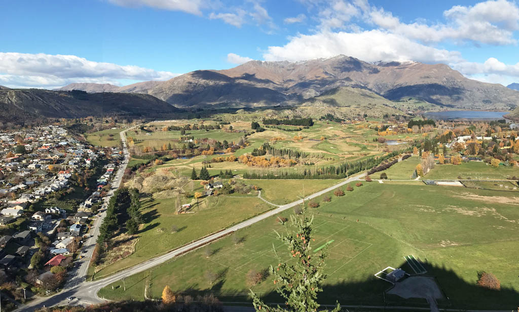Elevated view across The Hills and the wider Arrowtown landscape from Feehly Hill.